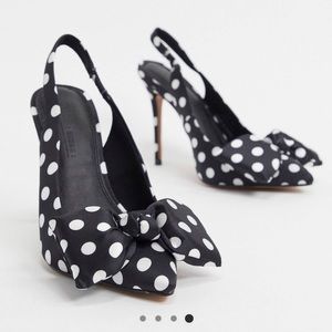 ASOS DESIGN Wide Fit Pheebs slingback stiletto heels with bow in black and white